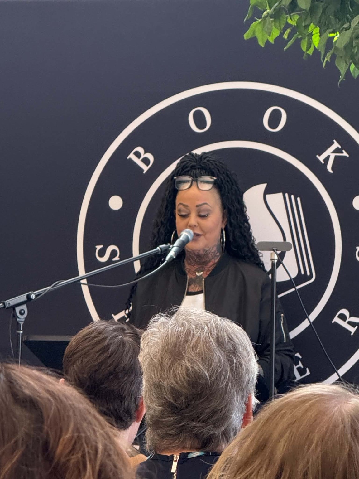 Della Steinke speaking at a public book event